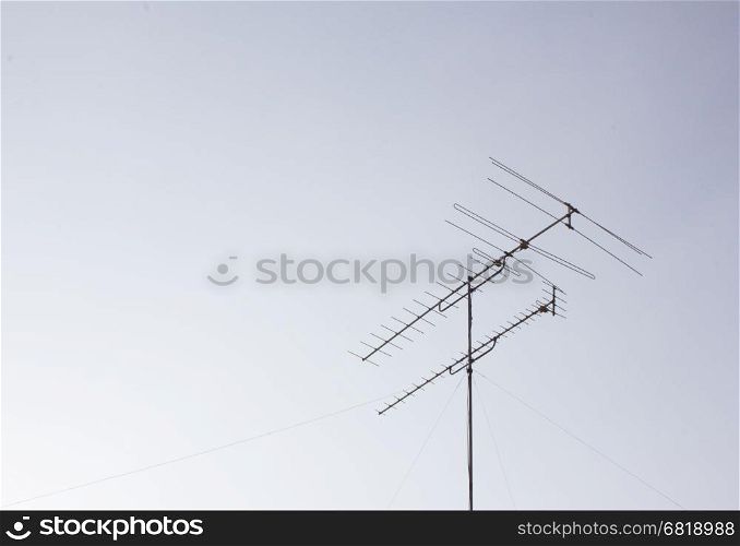 A tv antenna with the clear sky