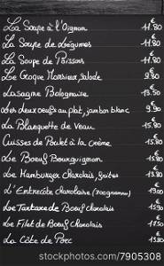 A typical cafe menu written on chalk on a blackboard as seen in the twon of Beaune in France.