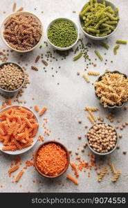 A variety of fusilli pasta made from different types of legumes, green and red lentils, mung beans and chickpeas. Gluten-free pasta.