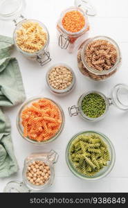 A variety of fusilli pasta made from different types of legumes, green and red lentils, mung beans and chickpeas. Gluten-free pasta.