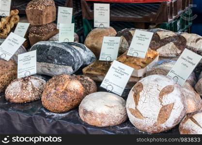 A variety of organic bread on farmers market stall