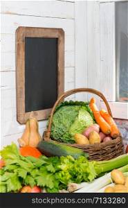 a variety of raw vegetables on the wooden table