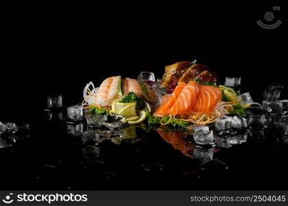 a variety of sushi with pieces of melting ice on a black background with reflection. sushi on black background