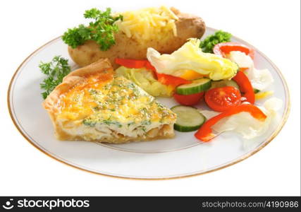 A vegetarian meal of homemade quiche with a baked potato and salad on a plate, high key.