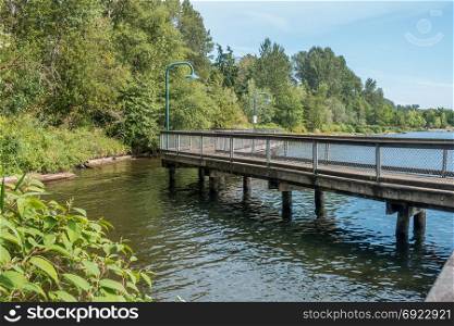 A veiw of a walkway over the water at Coulon Park in Renton, Washington.