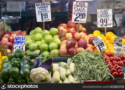 A vendor displays her food produce at the Pike Place Public Market in Seattle