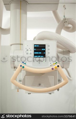 A vertical detail of an x-ray machine in a hospital