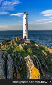 A vertical view of the Cabo Home lighthouse in western Galicia