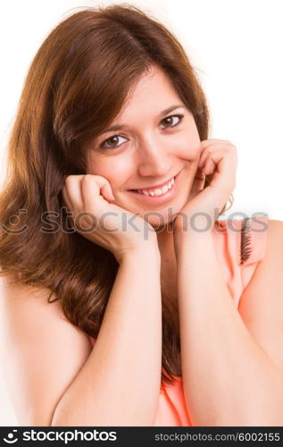 A very beautiful young woman posing isolated over copy space background