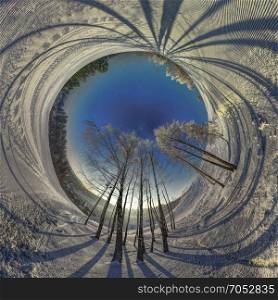 A very cold winter morning. Fisheye winter planet. Skiing trase.