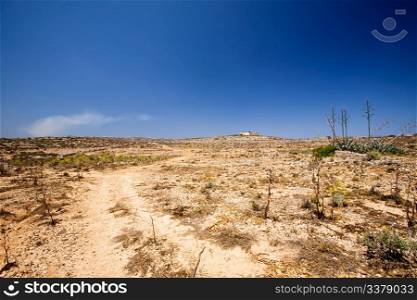 A very dry desert landscape, comino malta