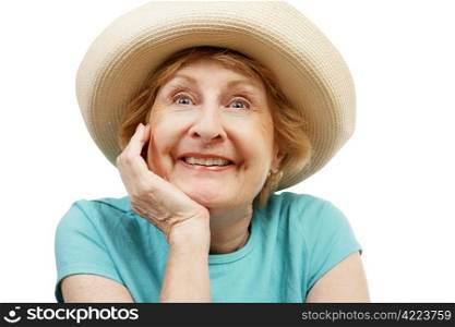 A very excited senior lady in a straw sun hat. Isolated on white.
