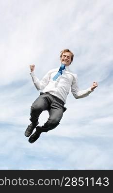 A very happy business man jumping