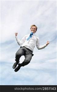 A very happy business man jumping