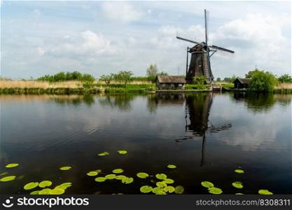 A view of a historic 18-century windmill at Kinderdijk in South Holland
