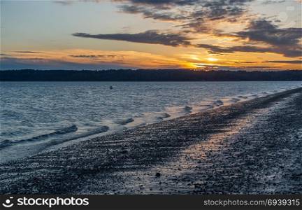 A view of a sunset from Three Tree Point in Burien, Washington.