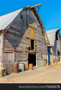 A view of an old weatherbeatn barn in Auburn, Washington. HDR image.