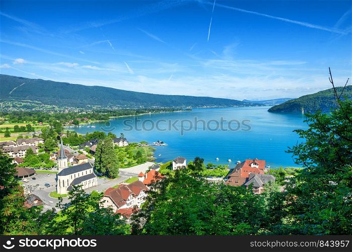 a view of Annecy lake in french Alps with Duingt village