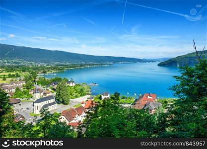 a view of Annecy lake in french Alps with Duingt village