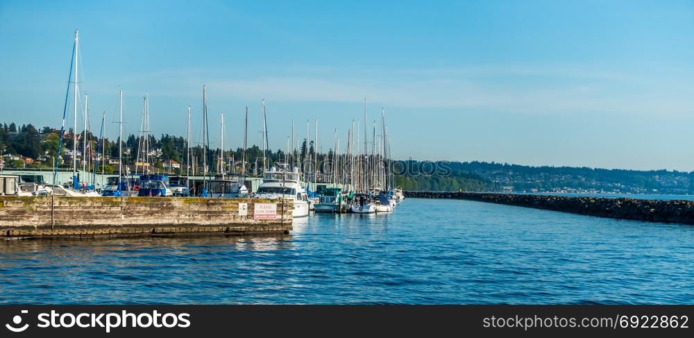 A view of boats moored at Des Moines Marina in Washington State.