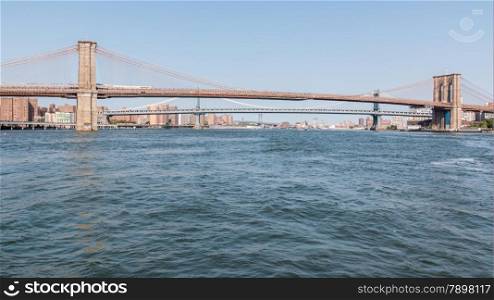 A view of Brooklyn bridge with Manhattan bridge in the background