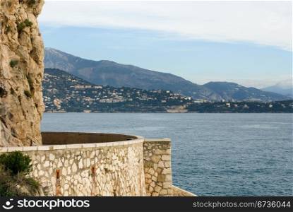 A view of Cap-Martin, captured from a coastal walkway in Monte Carlo, Monaco.