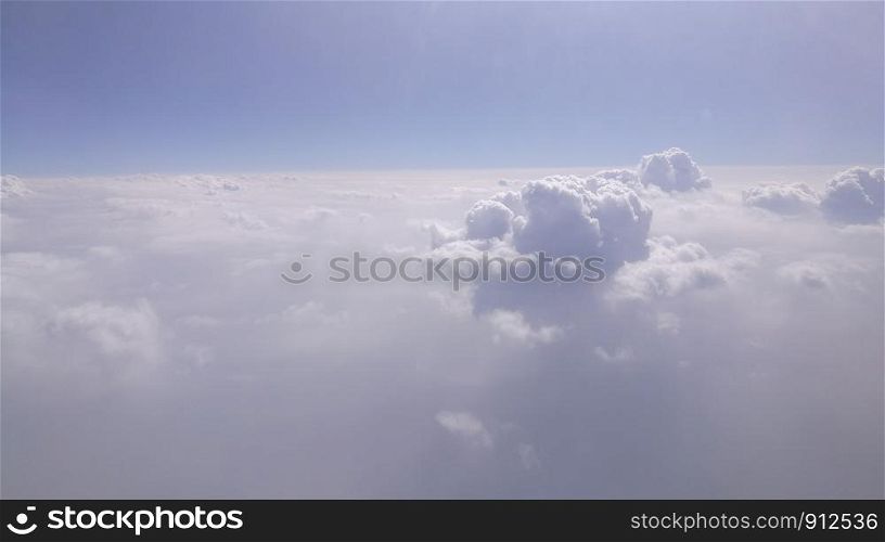 A view of clouds from airplane's window.