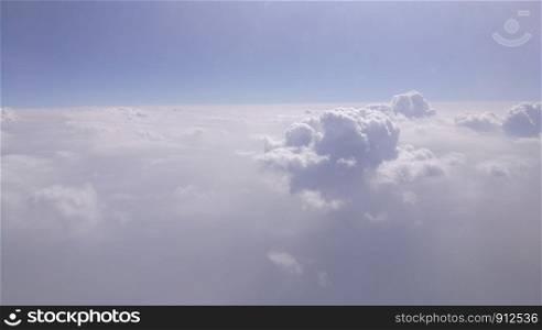A view of clouds from airplane's window.