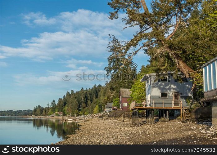 A view of homes on Hood Canal in Wahsinton State at low tide.