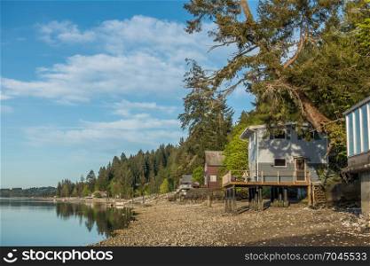 A view of homes on Hood Canal in Wahsinton State at low tide.