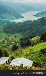 A view of Lake Bunyonyi as the family, in the house right below, views it every day, from over their agricultural land, high up in the hills in the south of Uganda.