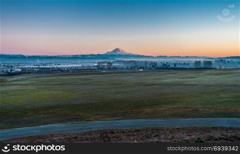 A view of Mount Rainier from Kent, Washington at sunset