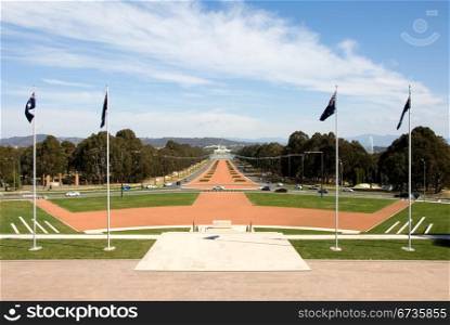 A view of Old Parliament House and New Parliament House, captured from the front of the National War Memorial, at the end of Anzac Avenue, Canberra, Australia