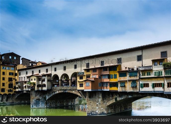 a view of Ponte Vecchio bridge ovre the river Arno in Florence, Italy