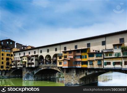 a view of Ponte Vecchio bridge ovre the river Arno in Florence, Italy