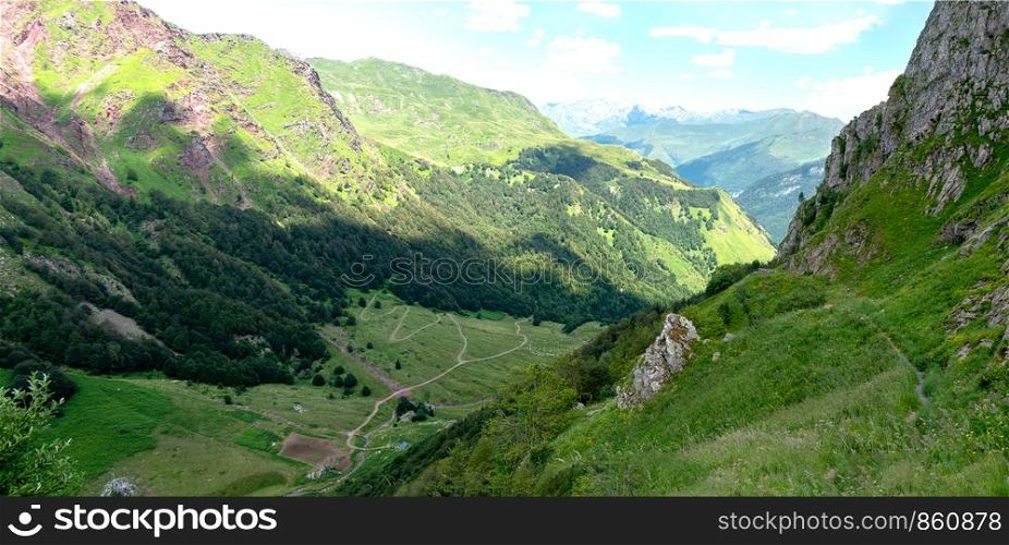 a view of Pyrenees mountains with blue sky