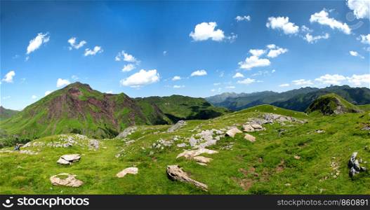 a view of Pyrenees mountains with blue sky