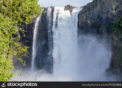 A view of Snoqualmie Falls in Washington State from down river.