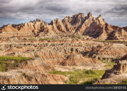 A view of some of the rugged landscape and steep hills characteristic of the terrain in the Badlands National Park in South Dakota.&#xA;