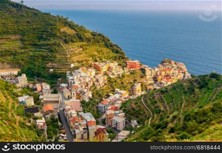 A view of the colorful traditional houses on the rock. The coast of Liguria. Manarola, Cinque Terre.