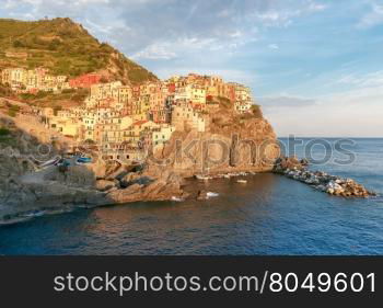 A view of the colorful traditional houses on the rock. The coast of Liguria. Manarola, Cinque Terre.