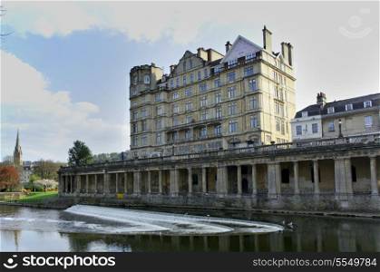 A view of the former Empire Hotel, beside the River Avon, in Bath, Somerset, England. The building is now divided into apartments.