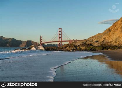 A view of the Golden Gate Bridge at Baker Beach, a very popular spot for locals and tourists in the San Francisco Bay Area.