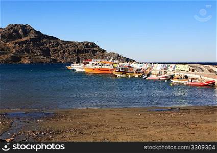 A view of the harbour at Plakias, Crete. Boat and engine names removed.