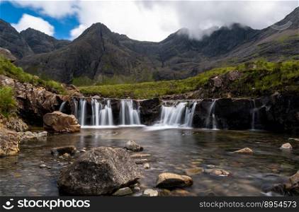 A view of the idyllic and picturesque cascades and pools at the Fairy Pools of the River Brittle on the Isle of Skye