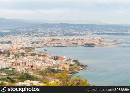 A view of the old town and the Venetian harbor of Chania with the height.. Chania. Aerial view from the mountain top.