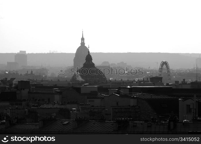 A view of the Parisian skyline, captured at dusk, from the rooftop of Galleries Lafayette