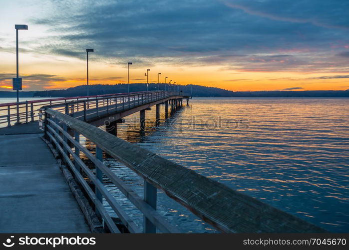 A view of the pier at Des Moines, Washington at sunset.