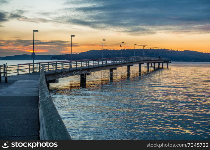 A view of the pier at Des Moines, Washington at sunset.