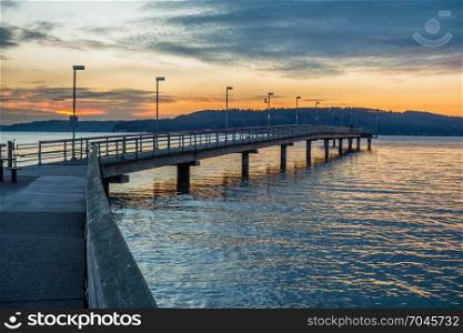 A view of the pier at Des Moines, Washington at sunset.